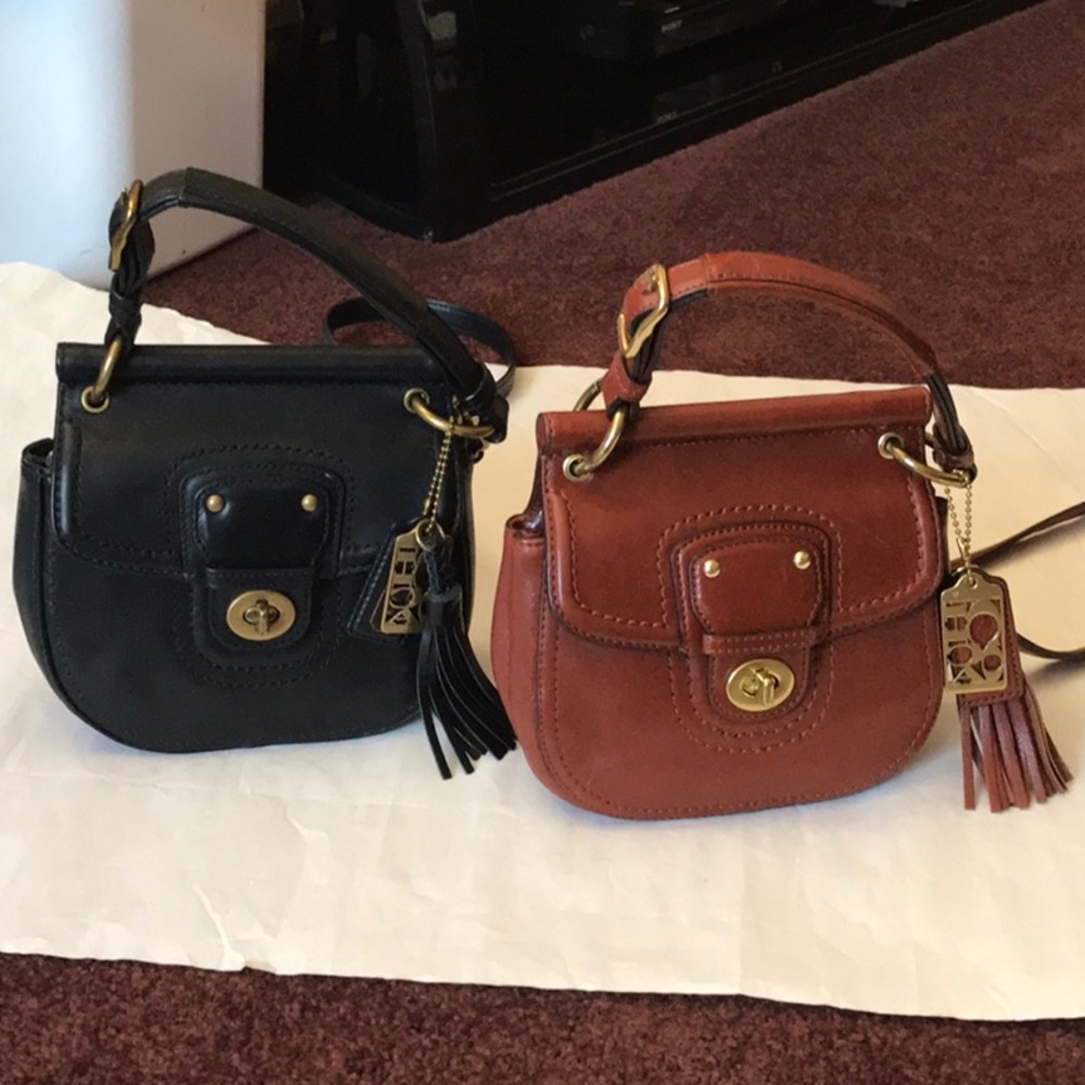 Small Coach purses. One black, one corovan.